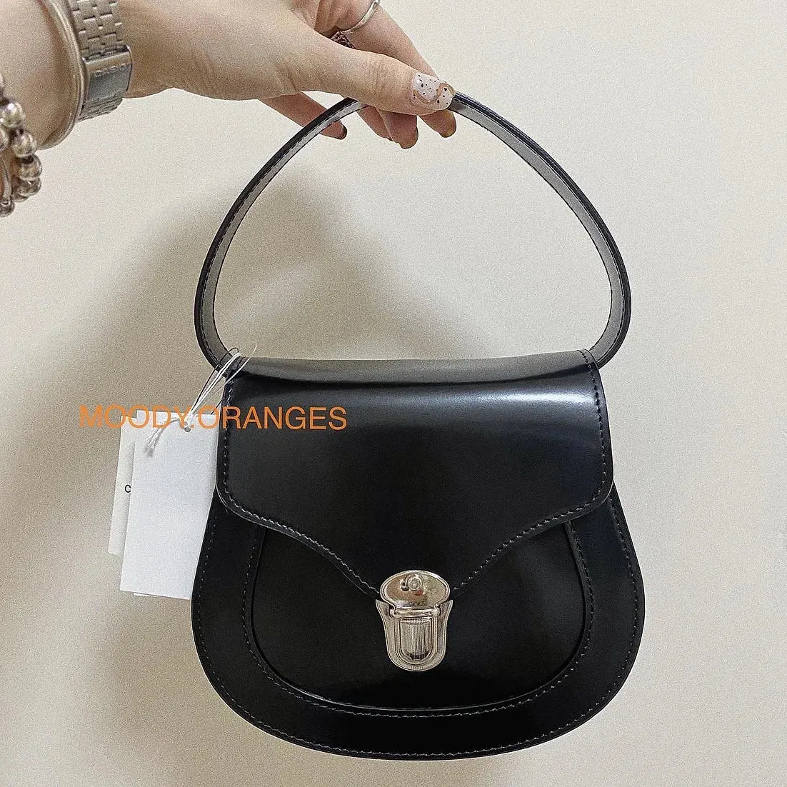 COMME des GARÇONS Locket Clutch Bag