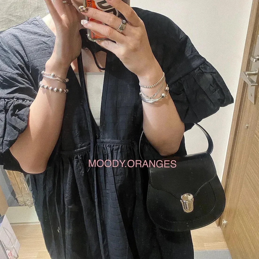 COMME des GARÇONS Locket Clutch Bag