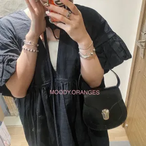 COMME des GARÇONS Locket Clutch Bag