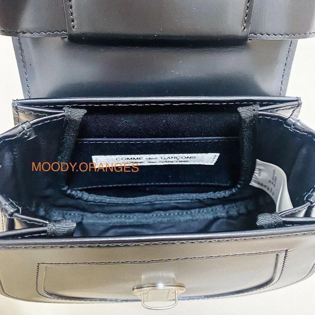 COMME des GARÇONS Locket Clutch Bag