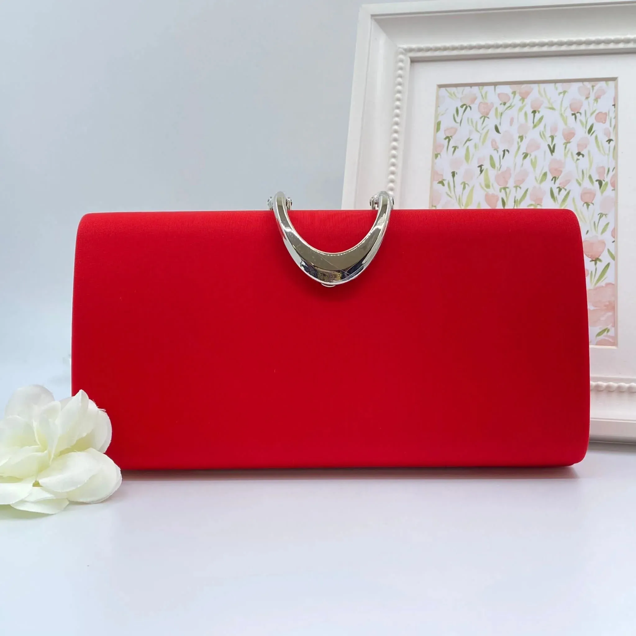 Molly clutch bag