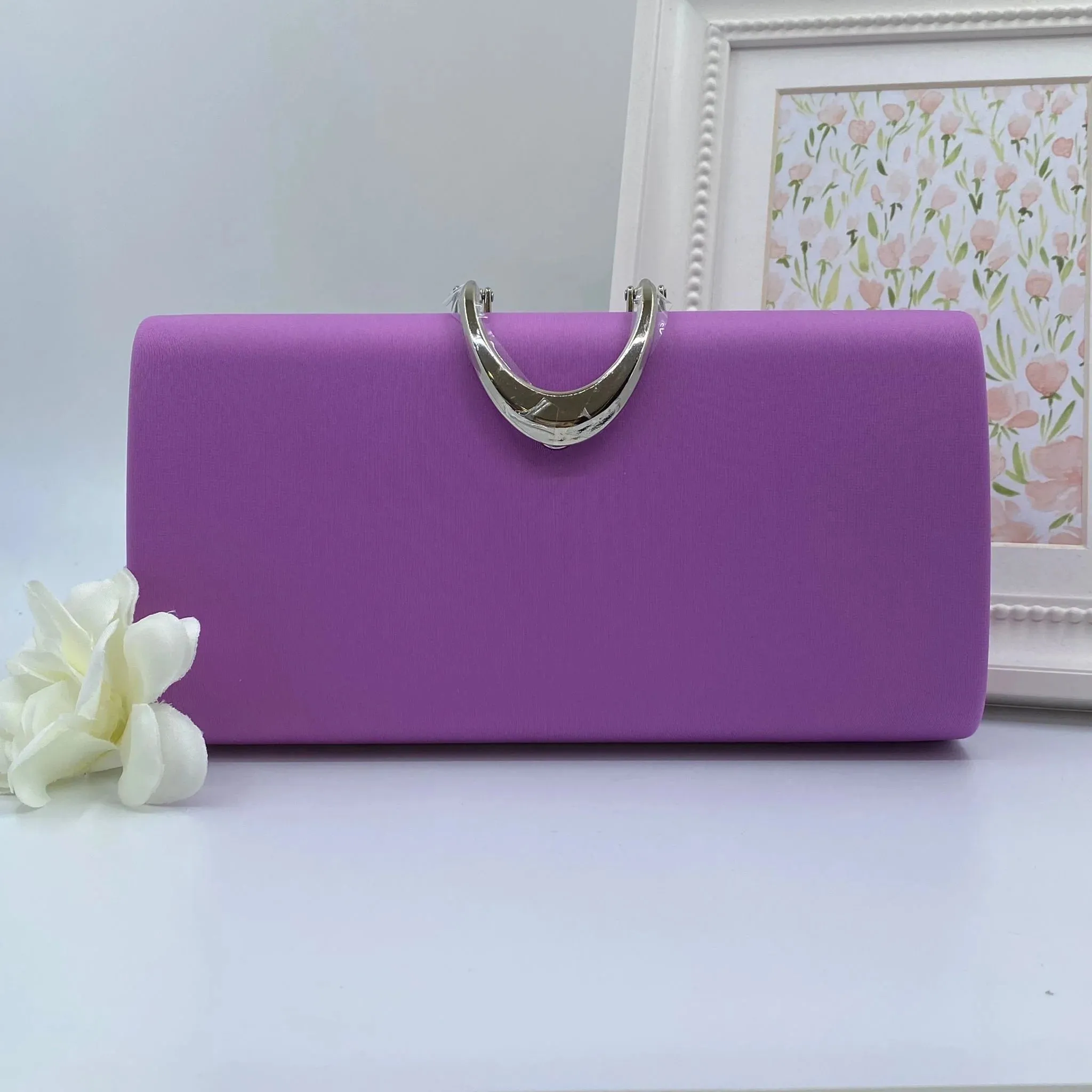 Molly clutch bag