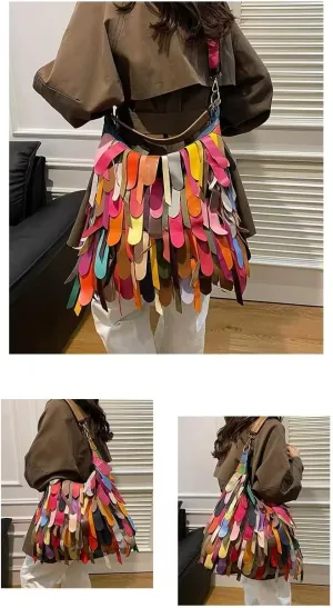 The handbag, multi-colored patchwork design, can reach up to 14 inches on one shoulder/hand/slant